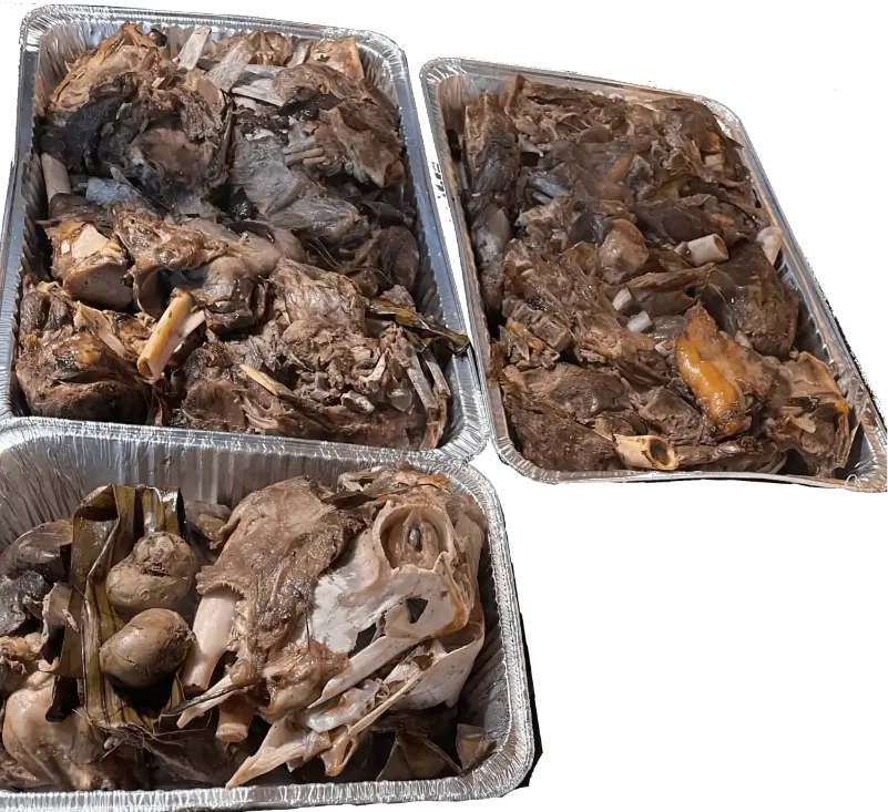 Barbacoa de chivo con cabeza